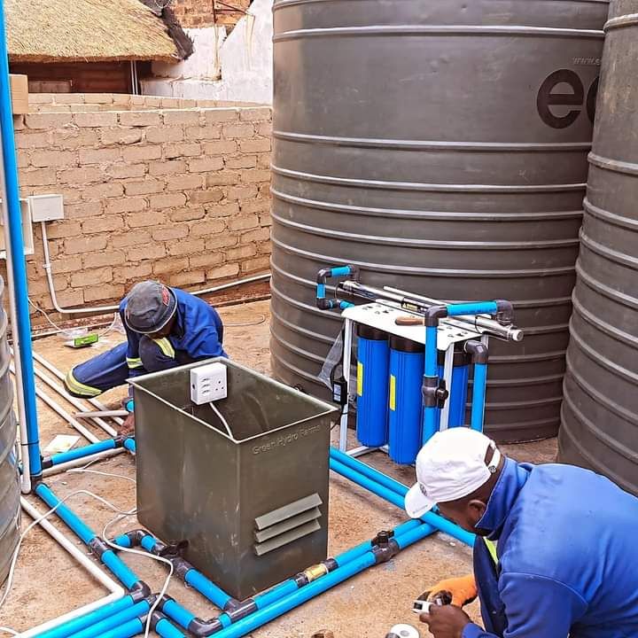 Dual JoJo water storage tanks connected to home filtration system
