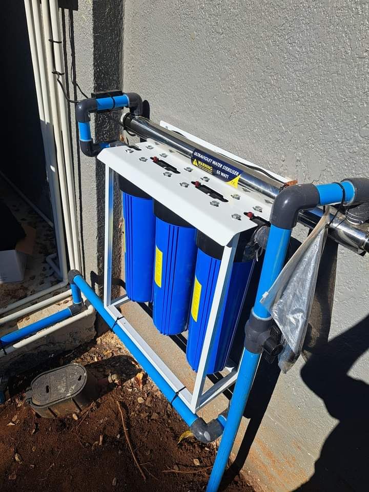 Residential water storage tanks and multi-stage filtration setup